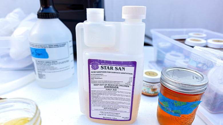 Bottle of Star San and honey jars