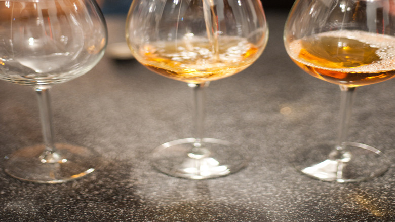 Mead being poured into glasses