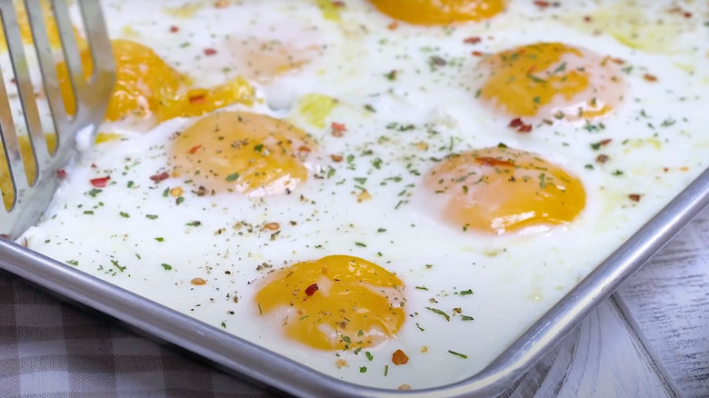 Eggs in pan with spatula