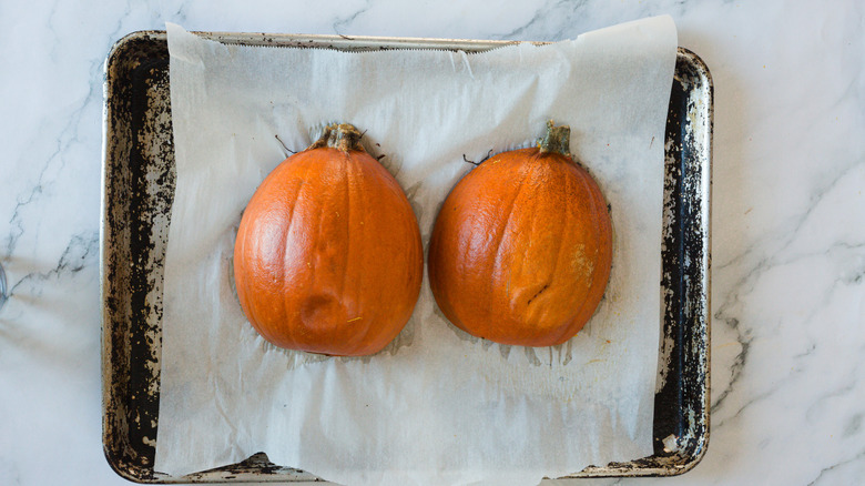 Two baked pumpkin halves