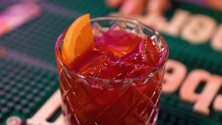 Glass of sangria with an orange slice garnish