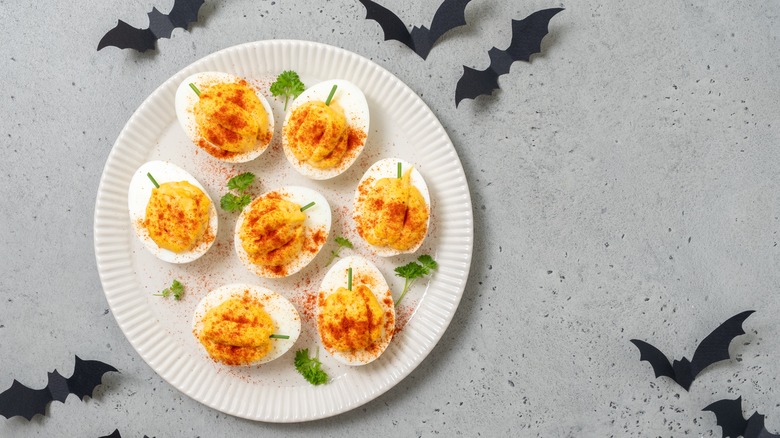 Olive spiders and deviled eggs