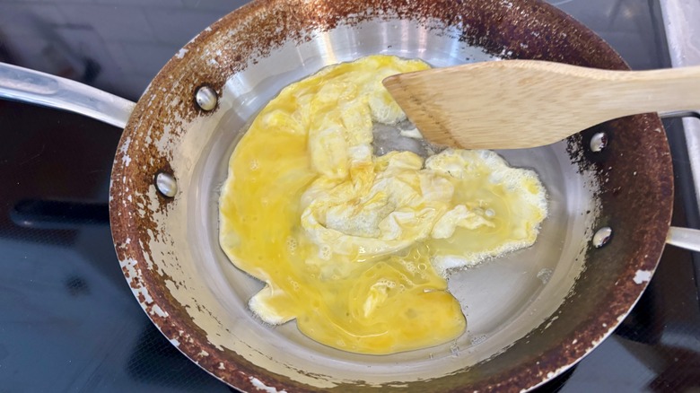 eggs scrambled in a pan