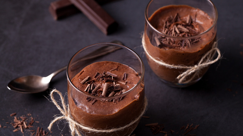 cups of chocolate pudding with chocolate shavings