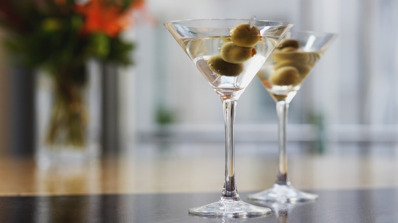 two martinis with olives