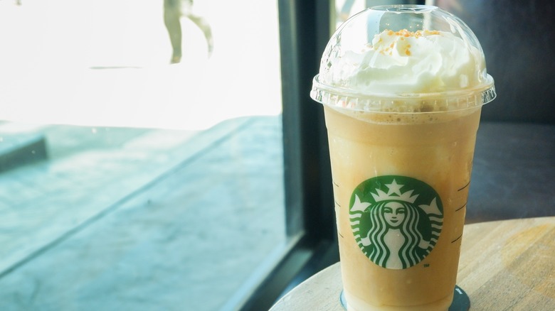 Yellow Starbucks Frappuccino on a table