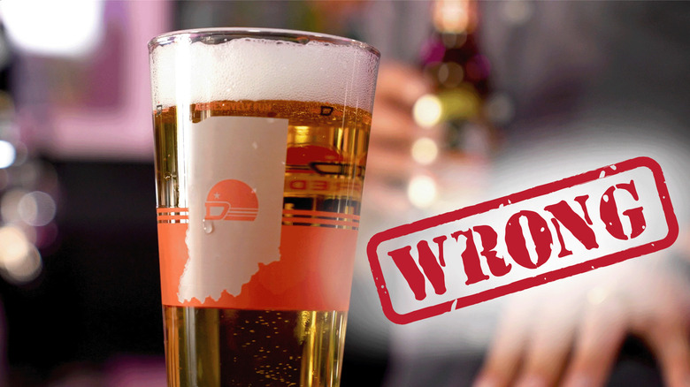 Full beer glass next to the word "wrong"