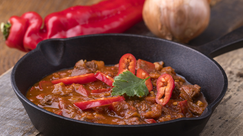 venison stew in a cast iron skillet