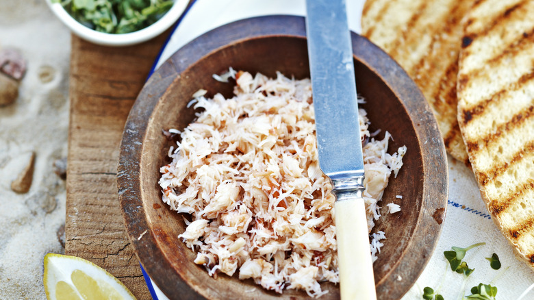 A bowl of shredded crab meat.