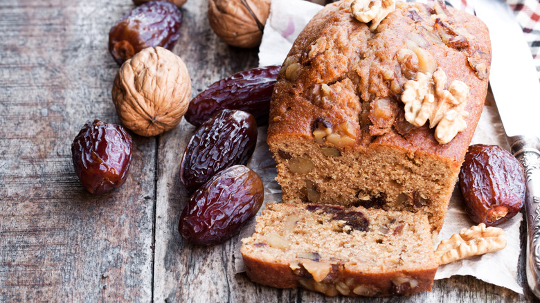 Homemade date and walnut bread on a wooden table