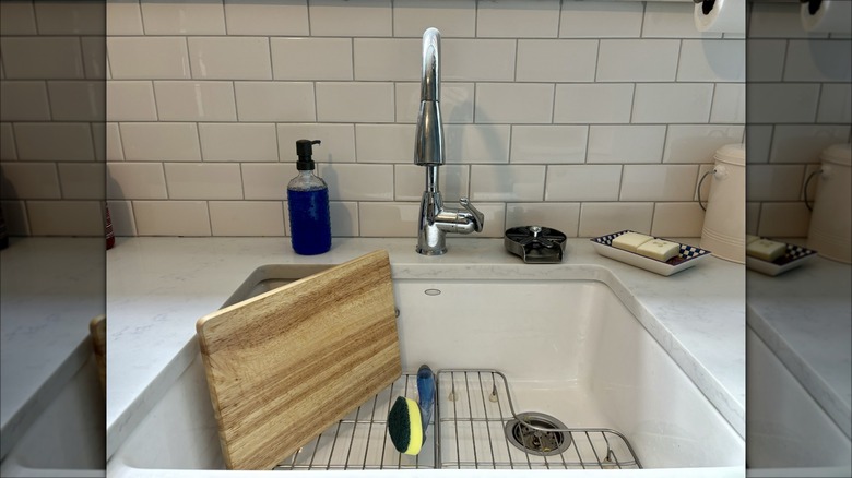 sink with a cutting board