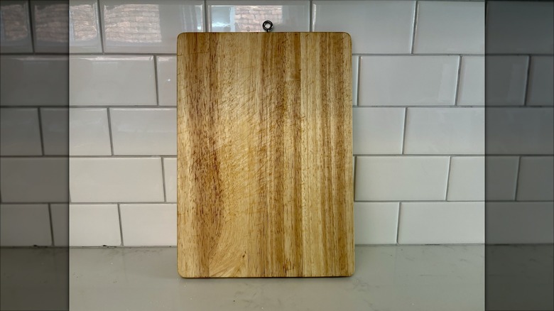 cutting board propped up to dry