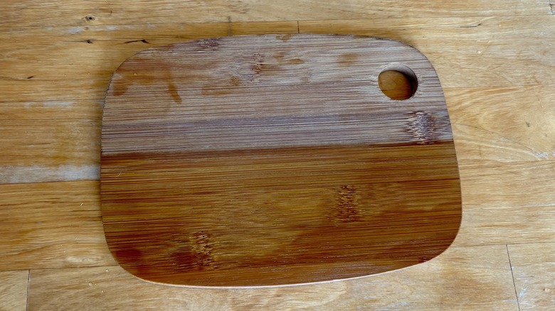 wooden cutting board half oiled