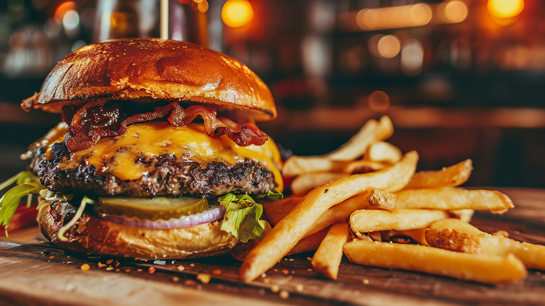 Restaurant burger and fries on platter