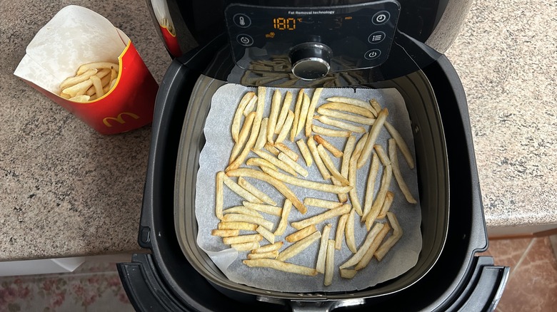 air fryer and package of fries