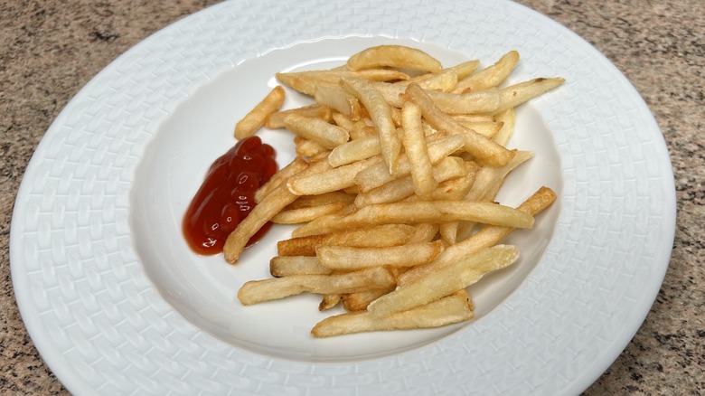 plate of fries and ketchup