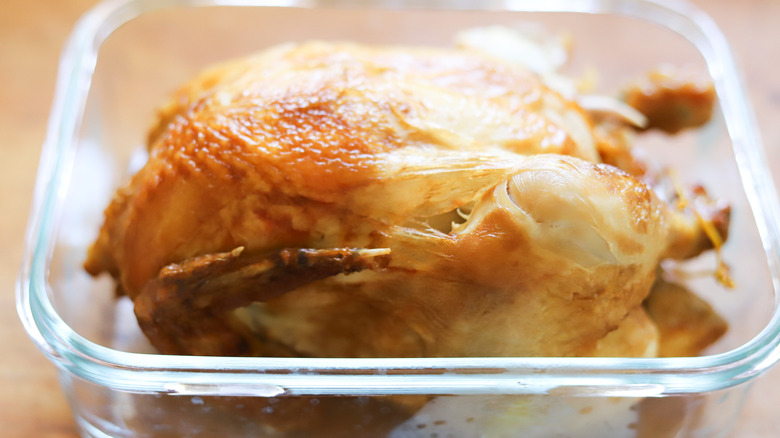 Rotisserie chicken in storage container