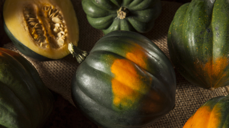 Green and orange acorn squash