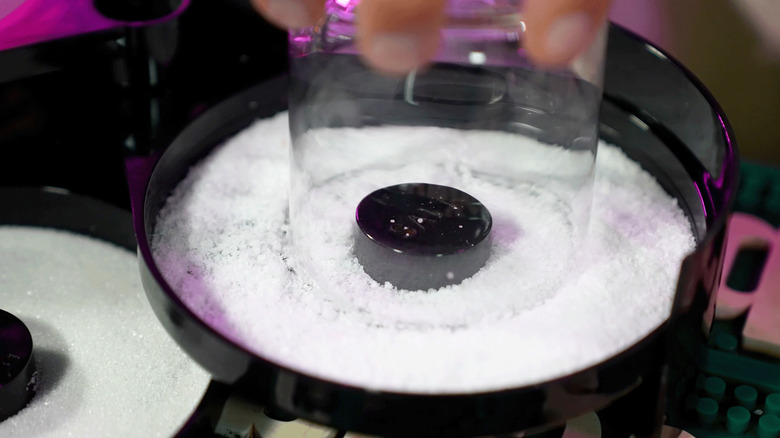 Dipping the rim of an empty glass into salt