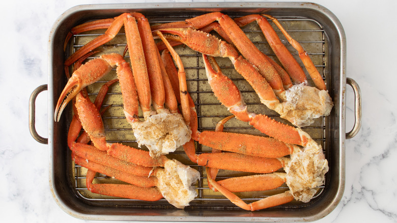 Crab legs in cooking pan