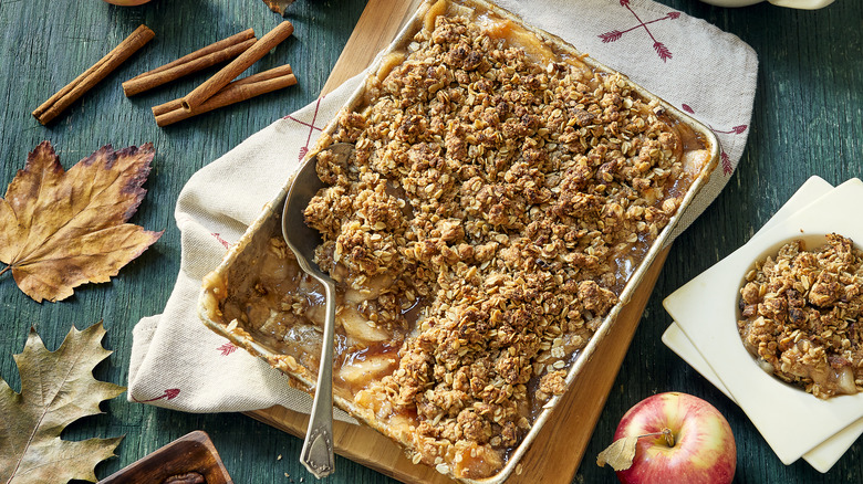 Apple crisp with cinnamon and leaves