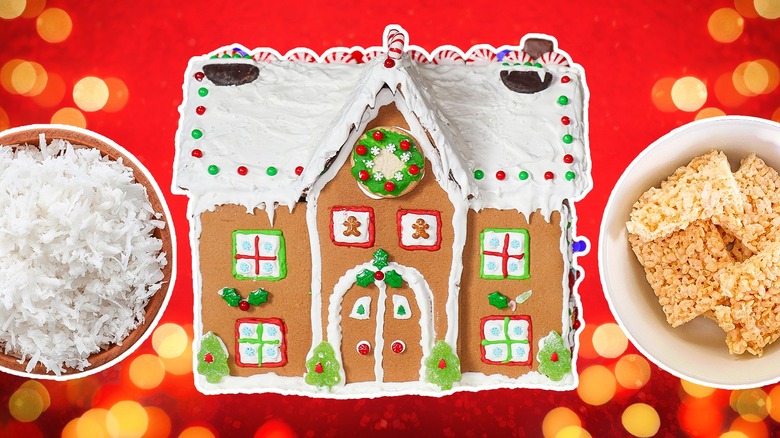 Decorated gingerbread house next to ingredient bowls with desiccated coconut and rice krispie treats