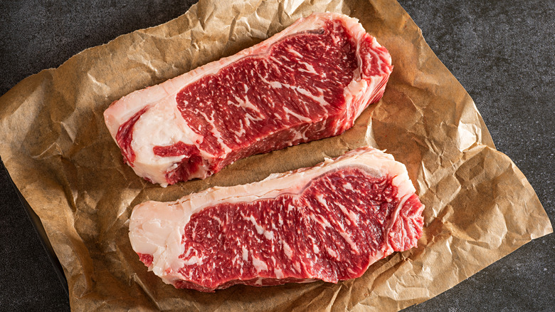 two new york strip steaks