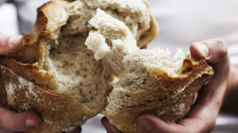 Broken apart loaf of bread