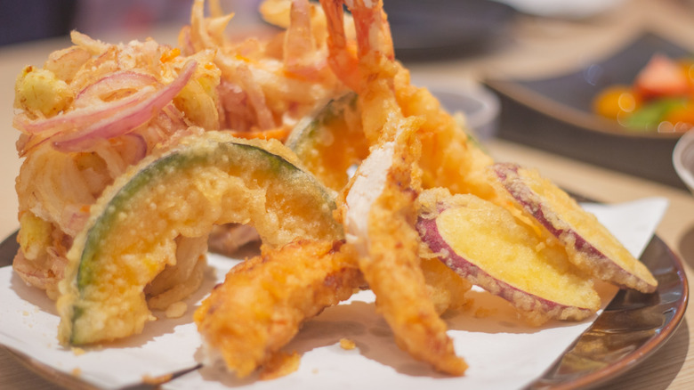 Arrangement of tempura shrimp and vegetables