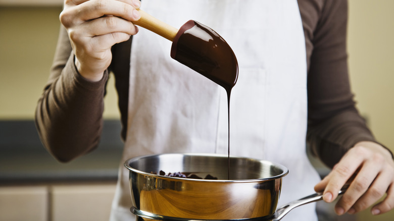 bowl of melted chocolate with spatula