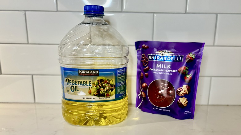 bottle of oil and candy metls