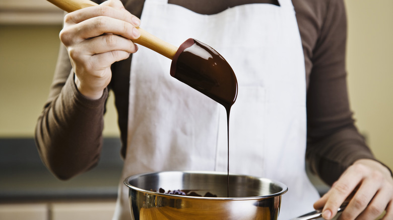 Melted chocolate and spoons