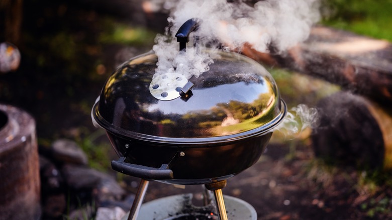 smoking outdoor charcoal grill