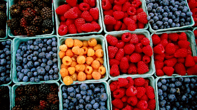 A variety of berries in containers