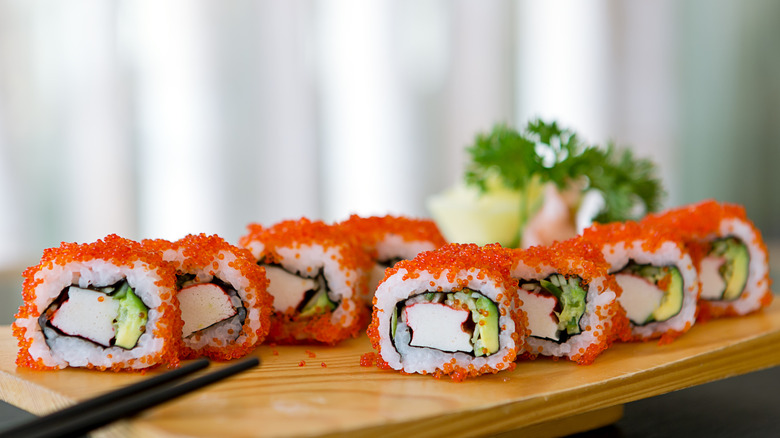 California sushi roll on wood board