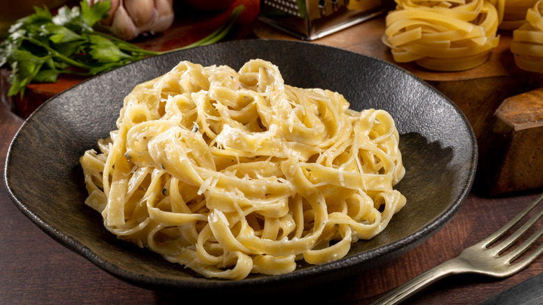 Plate of fettuccine Alfredo with creamy sauce