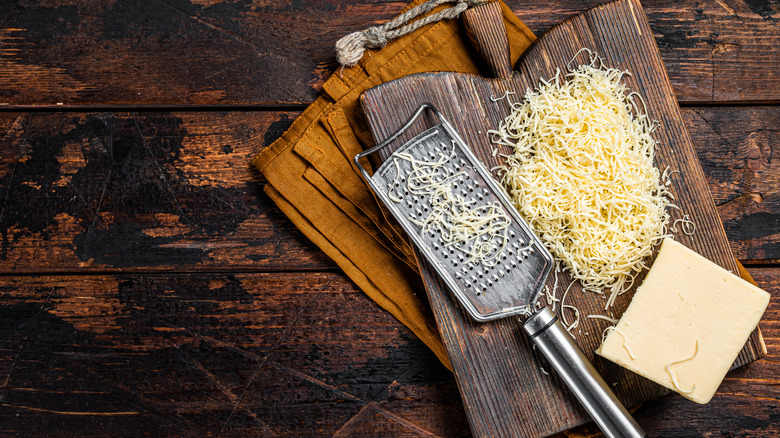 Grated white cheddar cheese