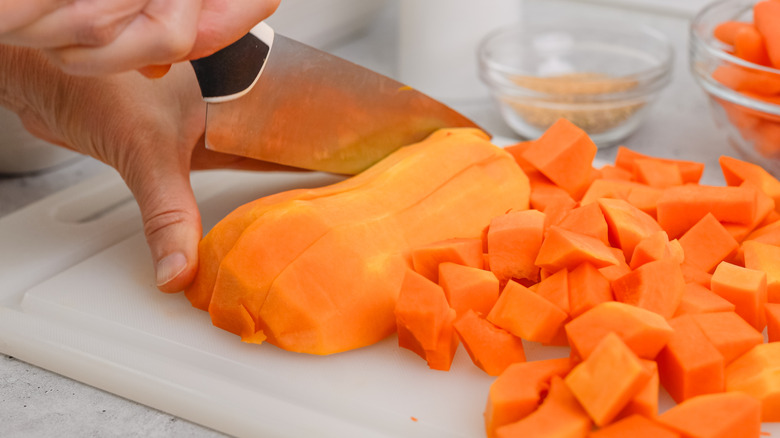 Cubing butternut squash with knife