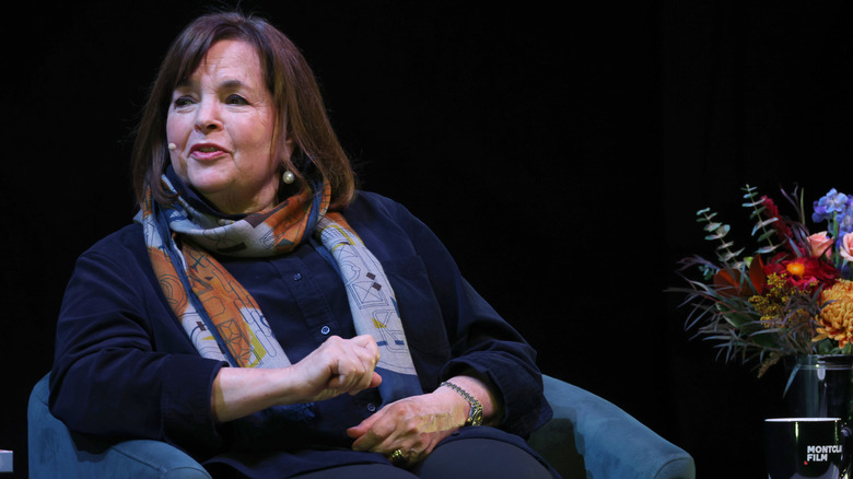 Ina Garten talking in armchair