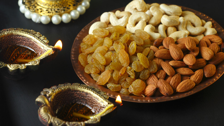 nuts and dried fruits with lamps