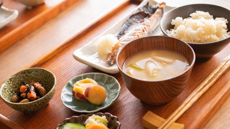 Japanese breakfast platter spread out on a table.