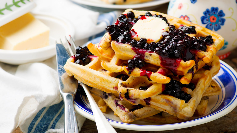 waffles served with berry jam and butter