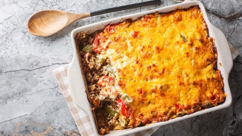 Cheesy casserole in a dish on a countertop