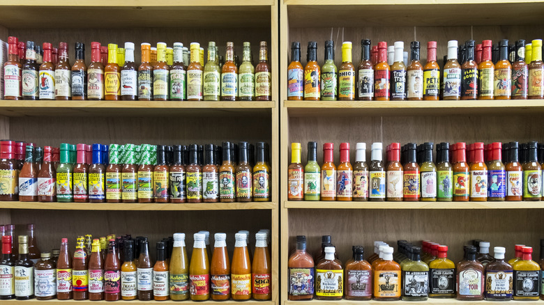 shelves full of hot sauce