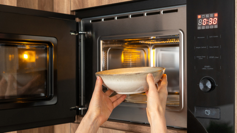 Placing bowl into the microwave