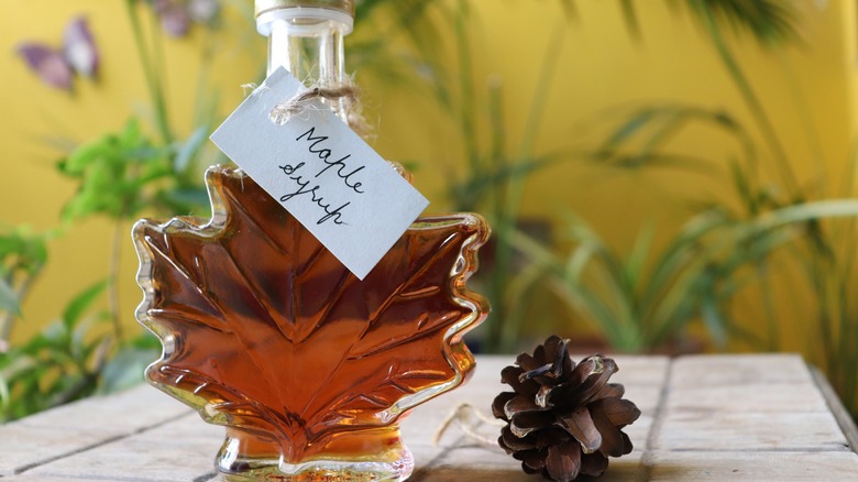 Maple syrup pouring on a spoon