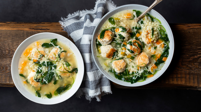 Two Italian wedding soup bowls