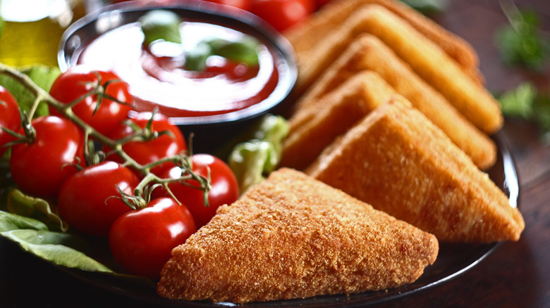 Mozzarella in carrozza sandwich with tomatoes