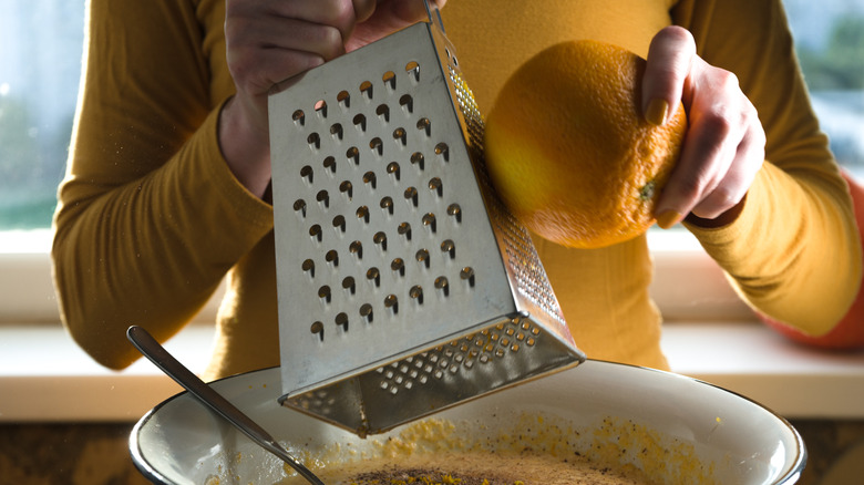 Zesting an orange into batter