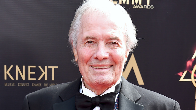 Jacques Pépin smiling on red carpet